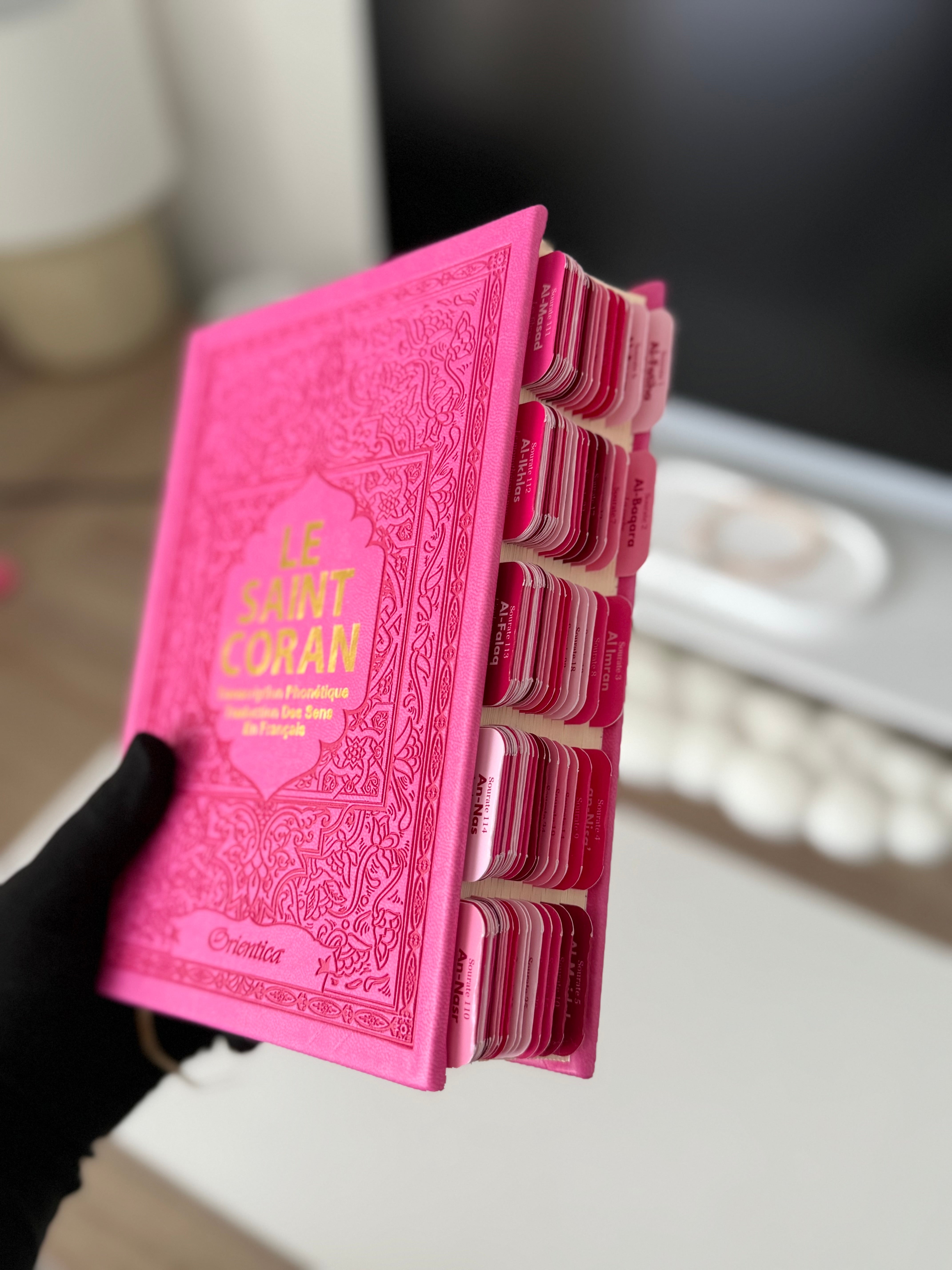 Quran with raspberry tabs